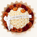 Updated autumn bouquet with orange pumpkins
